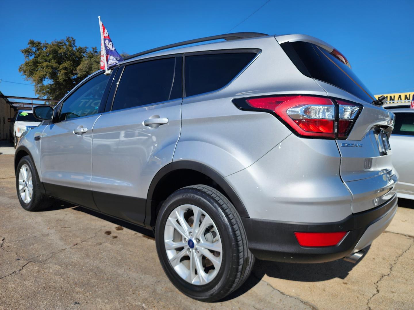 2017 SILVER Ford Escape SE (1FMCU0GD3HU) with an 1.5L L4 DOHC 16V engine, 6A transmission, located at 2660 S.Garland Avenue, Garland, TX, 75041, (469) 298-3118, 32.885551, -96.655602 - Welcome to DallasAutos4Less, one of the Premier BUY HERE PAY HERE Dealers in the North Dallas Area. We specialize in financing to people with NO CREDIT or BAD CREDIT. We need proof of income, proof of residence, and a ID. Come buy your new car from us today!! This is a Super Clean 2017 FORD ESCAP - Photo#5